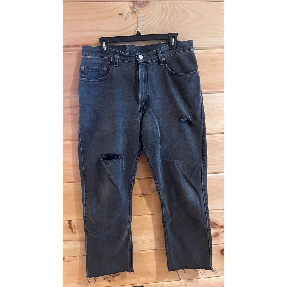 Vintage Perfectly Distressed and Reworked High Waisted Levi's 505 Jeans